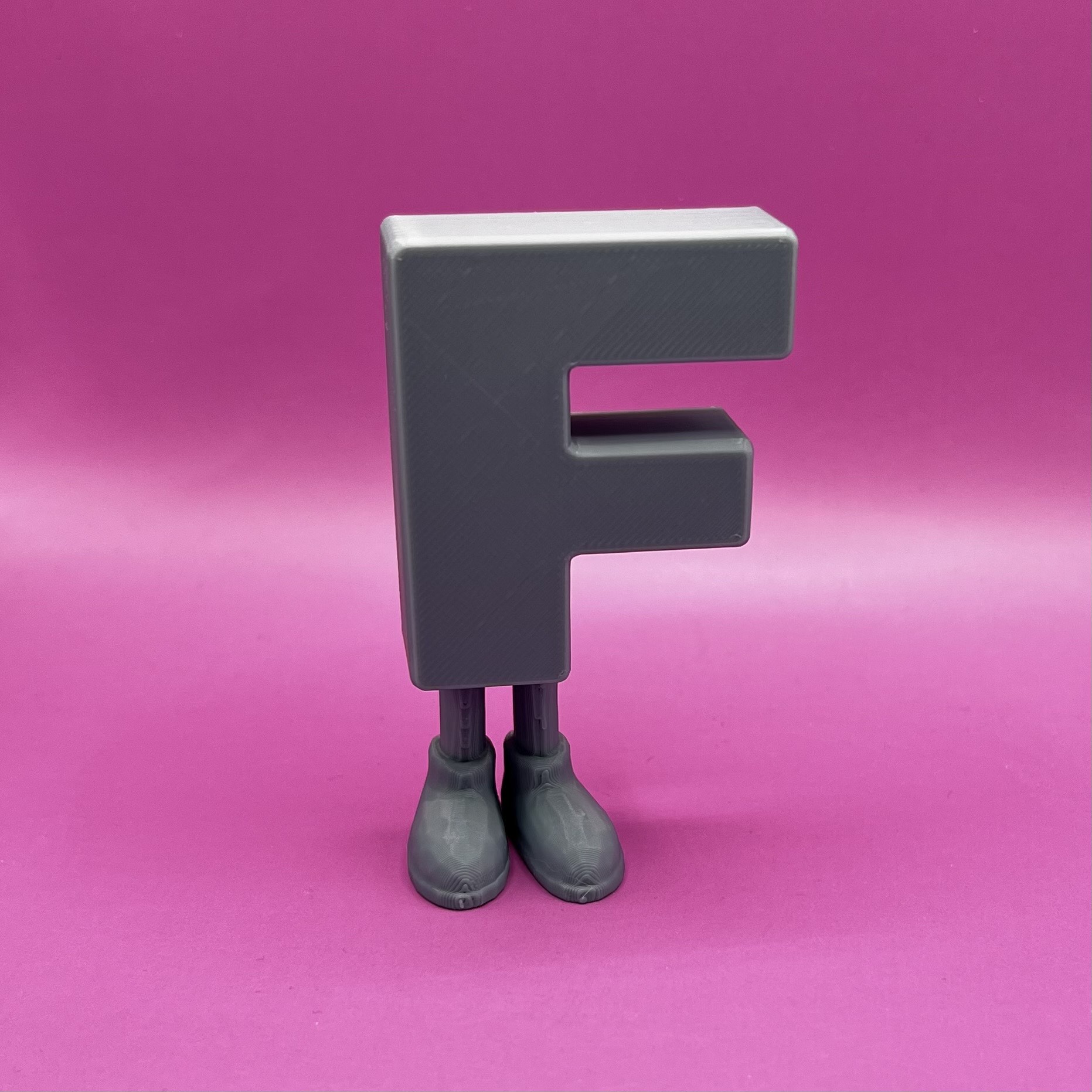 Letter F with legs