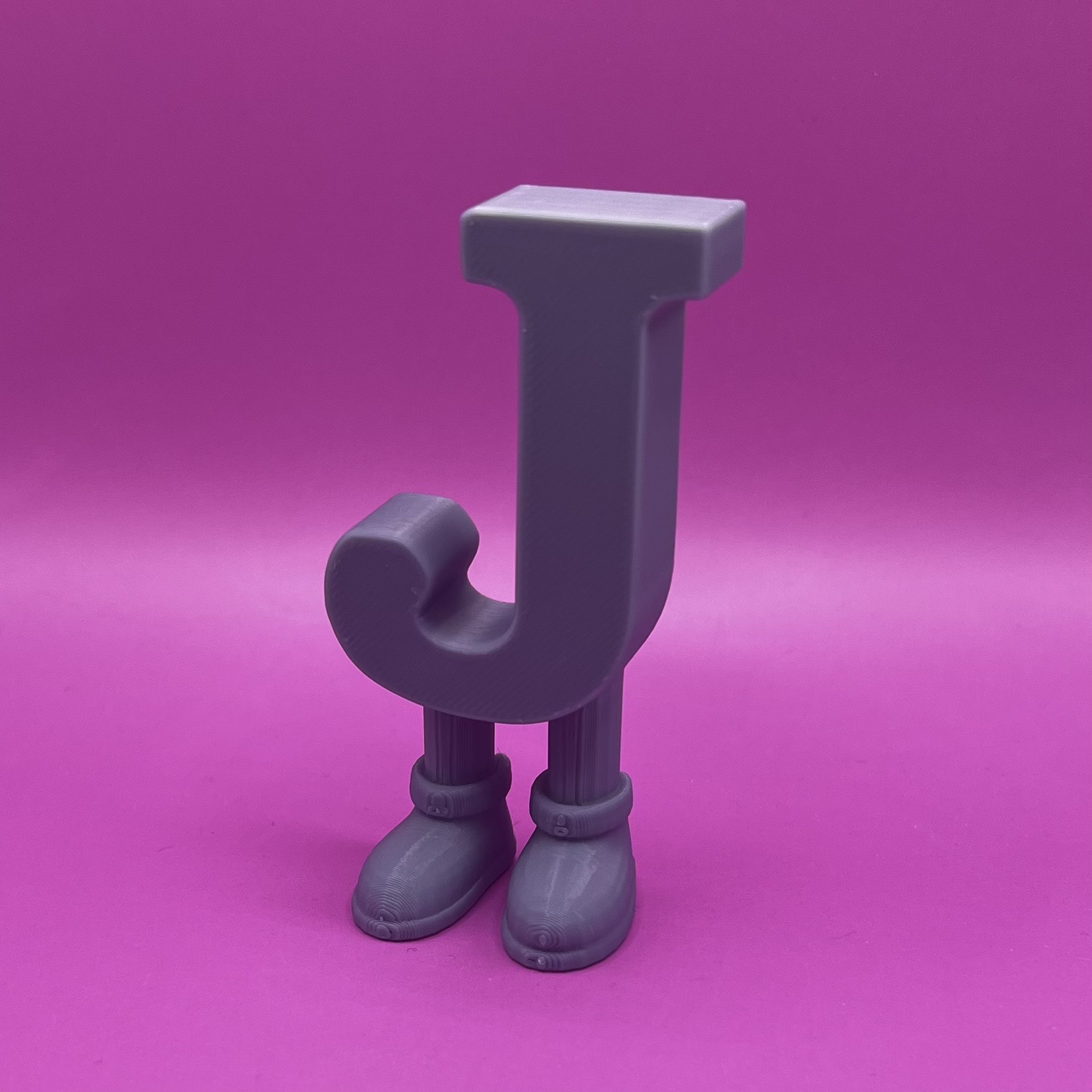 Letter J with legs