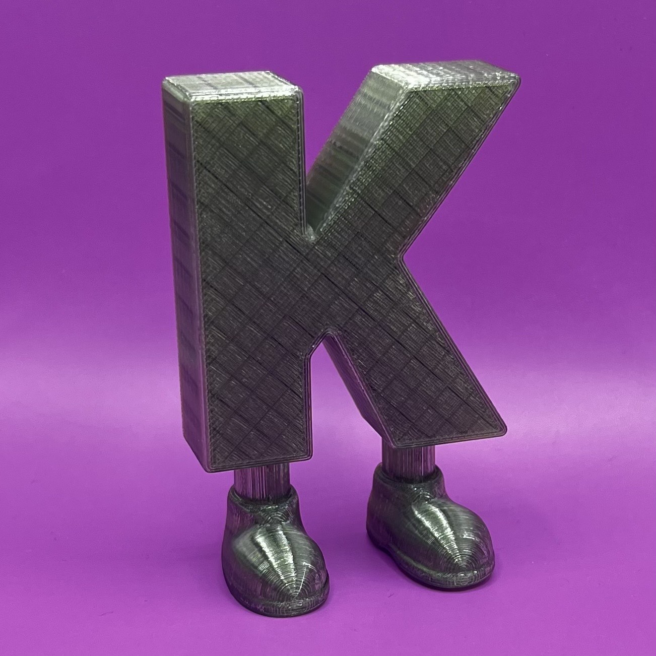 Letter K with legs