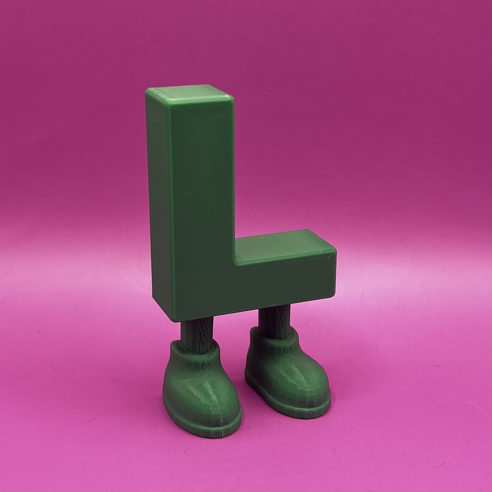 Letter L with legs