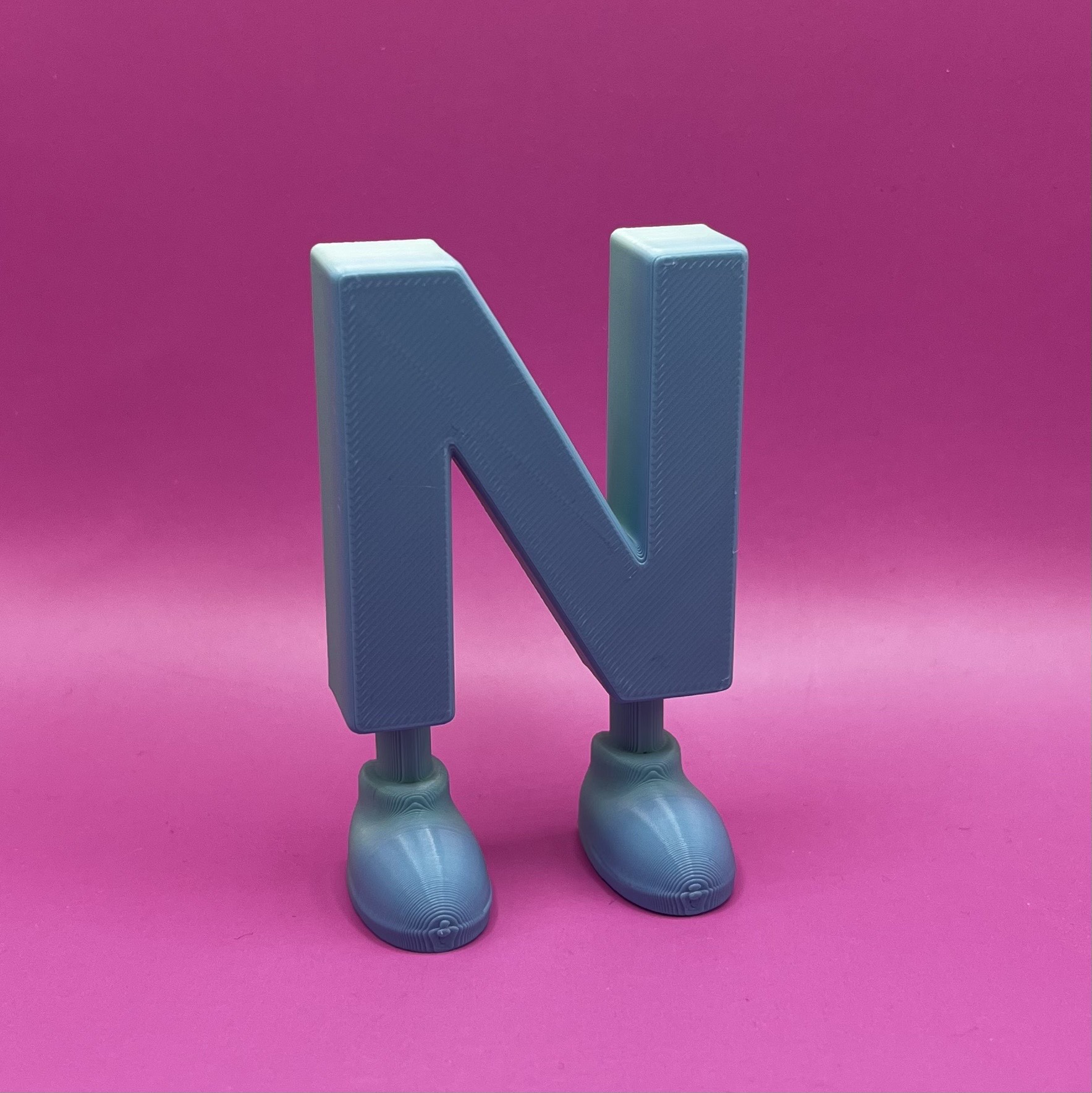 Letter N with legs