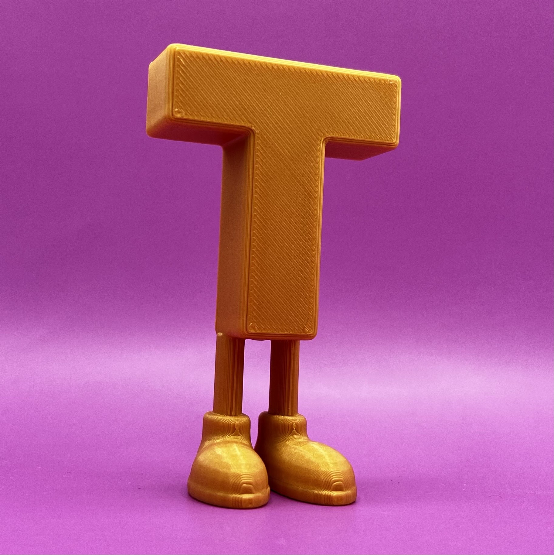 Letter T with legs