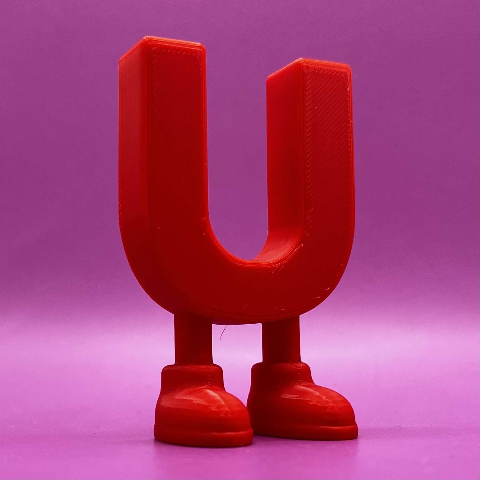 Letter U with legs